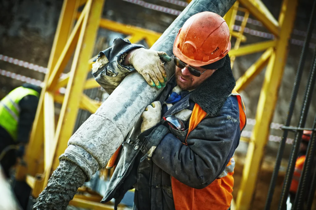 A man working construction. Being injured at work can happen to anyone at any time and when it is due to negligence of your employer and safety issues you should consider contacting a personal injury lawyer.